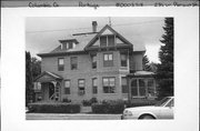 235 W PLEASANT ST, a Queen Anne house, built in Portage, Wisconsin in 1897.