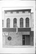 214 W WISCONSIN ST, a Italianate retail building, built in Portage, Wisconsin in 1869.