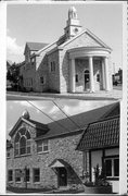 417 W WISCONSIN ST, a Colonial Revival/Georgian Revival church, built in Portage, Wisconsin in 1933.