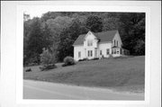 55310 STH 171, a Cross Gabled house, built in Freeman, Wisconsin in 1900.