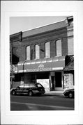 115 E Blackhawk Ave, a Commercial Vernacular retail building, built in Prairie du Chien, Wisconsin in 1899.