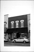 124 E Blackhawk Ave, a Commercial Vernacular retail building, built in Prairie du Chien, Wisconsin in 1874.