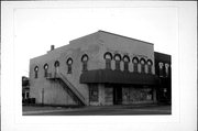 130 E Blackhawk Ave, a Romanesque Revival retail building, built in Prairie du Chien, Wisconsin in 1872.