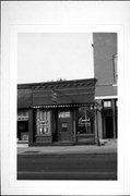 209 W Blackhawk Ave, a Commercial Vernacular retail building, built in Prairie du Chien, Wisconsin in 1867.