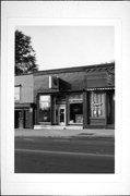 211 W Blackhawk Ave, a Commercial Vernacular small retail building, built in Prairie du Chien, Wisconsin in 1868.