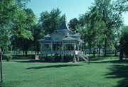 SWAN PARK AT NW CNR OF S UNIVERSITY ST AND E SOUTH ST, a Queen Anne pavilion, built in Beaver Dam, Wisconsin in 1880.