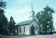 N SIDE OF COUNTY HIGHWAY Q, W OF RICH RD, a Early Gothic Revival church, built in Shields, Wisconsin in 1864.