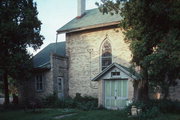 N SIDE OF COUNTY HIGHWAY Q, W OF RICH RD, a Early Gothic Revival church, built in Shields, Wisconsin in 1864.