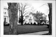 312 COLLEGE AVE, a Queen Anne house, built in Fox Lake, Wisconsin in 1881.