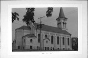 307 N MAIN ST, a Romanesque Revival church, built in Juneau, Wisconsin in 1903.