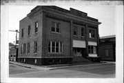 705 N WATER ST, a Commercial Vernacular retail building, built in Lomira, Wisconsin in 1913.