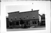 102-108 S MAIN ST, a Commercial Vernacular large retail building, built in Mayville, Wisconsin in 1873.
