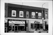 425-427 E MAIN ST, a Commercial Vernacular large retail building, built in Waupun, Wisconsin in 1893.