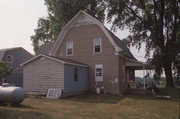 9390 CEMETERY RD, a Dutch Colonial Revival house, built in Brussels, Wisconsin in 1921.