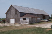 COUNTY HIGHWAY C, 1059, W SIDE, a Gabled Ell house, built in Brussels, Wisconsin in 1880.