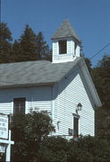 9988 MORAVIA ST, a Front Gabled one to six room school, built in Ephraim, Wisconsin in 1869.