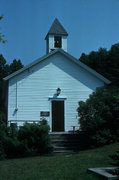 9988 MORAVIA ST, a Front Gabled one to six room school, built in Ephraim, Wisconsin in 1869.