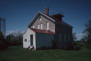 ROCK ISLAND, NW TIP, a Front Gabled lifesaving station facility/lighthouse, built in Washington, Wisconsin in 1858.