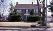 215 E SUMNER, a Colonial Revival/Georgian Revival house, built in Hartford, Wisconsin in 1926.