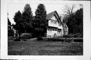 9353 COTTAGE ROW, a Craftsman house, built in Gibraltar, Wisconsin in 1898.