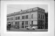 11 N 3RD AVE, a Neoclassical/Beaux Arts retail building, built in Sturgeon Bay, Wisconsin in 1906.