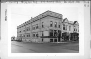 11 N 3RD AVE, a Neoclassical retail building, built in Sturgeon Bay, Wisconsin in 1906.