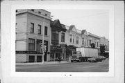 13-23 N 3RD AVE, a Queen Anne retail building, built in Sturgeon Bay, Wisconsin in 1884.