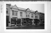 13-23 N 3RD AVE, a Queen Anne retail building, built in Sturgeon Bay, Wisconsin in 1884.