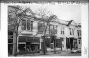 13-23 N 3RD AVE, a Queen Anne retail building, built in Sturgeon Bay, Wisconsin in 1884.