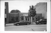 135 N 3RD AVE, a Commercial Vernacular small retail building, built in Sturgeon Bay, Wisconsin in 1988.