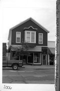 22 S 3RD AVE, a Front Gabled retail building, built in Sturgeon Bay, Wisconsin in 1872.