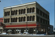 1301-1305 TOWER AVE, a Romanesque Revival large retail building, built in Superior, Wisconsin in 1892.