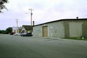 112-120 E MULLETT ST, a Astylistic Utilitarian Building industrial bldg/manufacturing facility, built in Portage, Wisconsin in 1918.