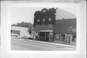 244 MAIN ST E, a Commercial Vernacular small retail building, built in Menomonie, Wisconsin in 1922.