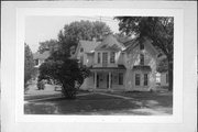 1303 MAIN ST E, a Queen Anne house, built in Menomonie, Wisconsin in 1880.