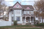 421 TALMADGE ST, a Queen Anne duplex/two-flat, built in Eau Claire, Wisconsin in 1895.