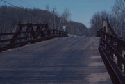 OLD WELLS RD AND RR TRACKS, a NA (unknown or not a building) pony truss bridge, built in Eau Claire, Wisconsin in 1911.