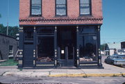 201 FARMERS ST, a retail building, built in Fairchild, Wisconsin in 1896.