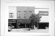 307 S BARSTOW ST, a Commercial Vernacular small retail building, built in Eau Claire, Wisconsin in 1870.