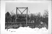 ACROSS EAU CLAIRE RIVER, N OF BOYD PARK PLAYGROUND, a NA (unknown or not a building) bridge, built in Eau Claire, Wisconsin in 1932.