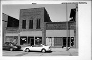 208 EAU CLAIRE ST, a Commercial Vernacular small retail building, built in Eau Claire, Wisconsin in 1875.