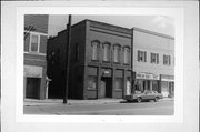 306 E MADISON ST, a Commercial Vernacular small retail building, built in Eau Claire, Wisconsin in 1889.