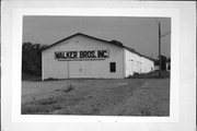 OXFORD AVE, W SIDE, JUST N OF PLATT ST INTERSECTION. OXFORD AVE, W SIDE, JUST N OF PLATT ST INTERSECTION., a Front Gabled lumber yard/mill, built in Eau Claire, Wisconsin in 1900.