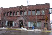 8 W DAVENPORT ST, a Prairie School bank/financial institution, built in Rhinelander, Wisconsin in 1911.