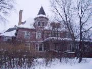 209 E FREDERICK ST, a Queen Anne house, built in Rhinelander, Wisconsin in 1892.