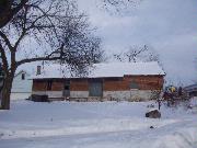 209 E RANDALL AVE, a Astylistic Utilitarian Building warehouse, built in Rhinelander, Wisconsin in 1904.
