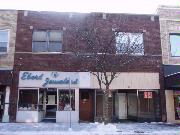 25-29 W DAVENPORT ST, a Commercial Vernacular large retail building, built in Rhinelander, Wisconsin in 1929.