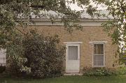 W140 STATE HIGHWAY 11, a Greek Revival house, built in Spring Prairie, Wisconsin in 1844.
