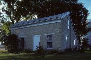 W140 STATE HIGHWAY 11, a Greek Revival house, built in Spring Prairie, Wisconsin in 1844.