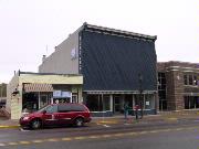 213-215 N BRIDGE ST, a Commercial Vernacular small retail building, built in Chippewa Falls, Wisconsin in 1889.